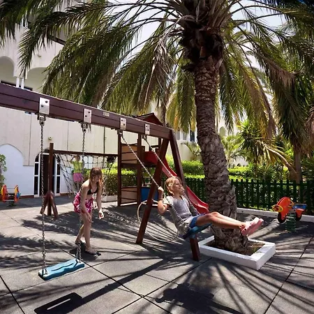 Отель Seaside Sandy 4*