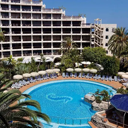 Отель Seaside Sandy 4*